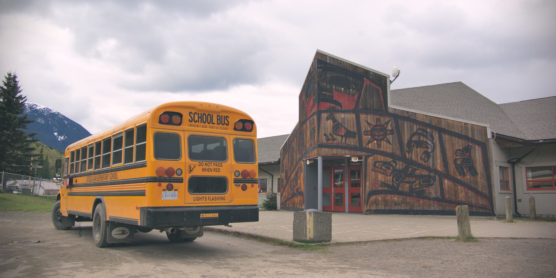 Elementary School Bus parked in front of Gitsegukla Elementary School